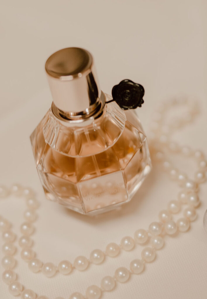 Wedding detail photography of brides perfume bottle 