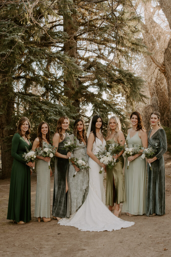 Bride and bridesmaids during Colorado winter wedding 
