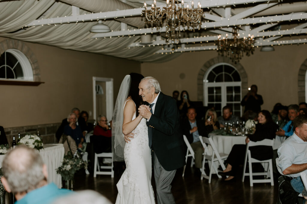 bride dancing with elderly grandfather